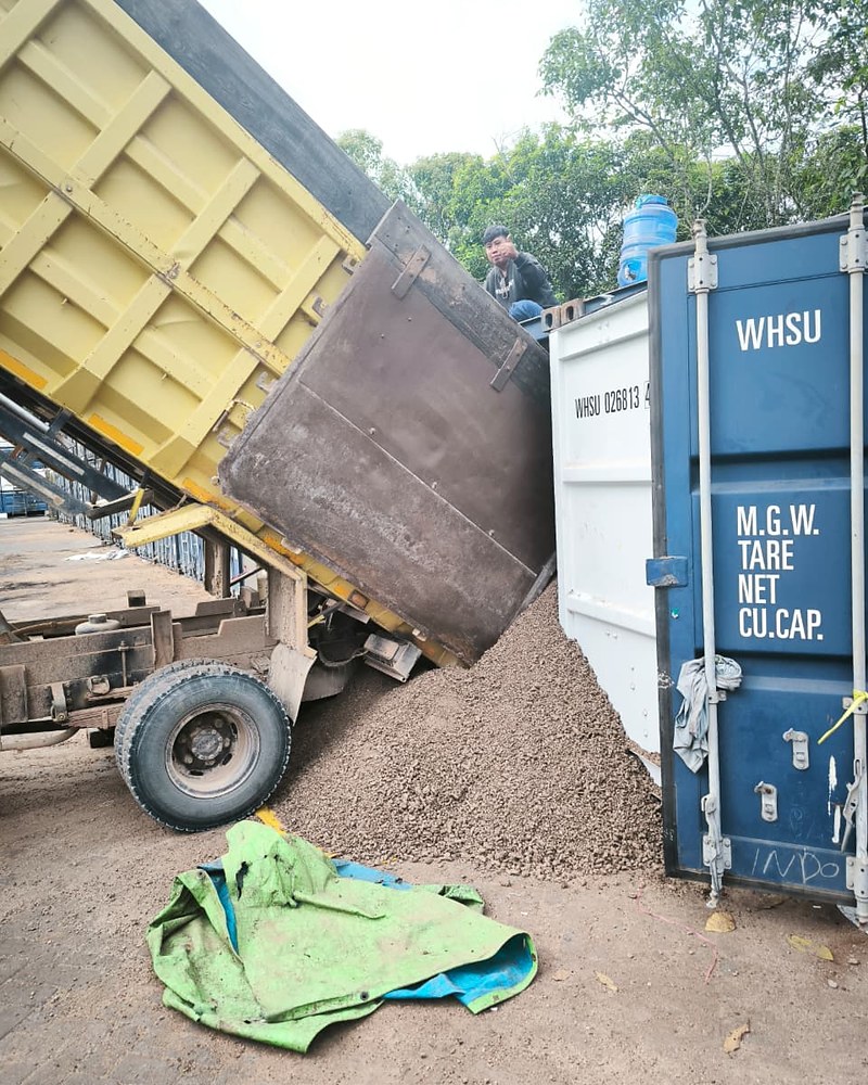 Truck Unloading PKE — Palm Kernel Expeller, East Kalimantan